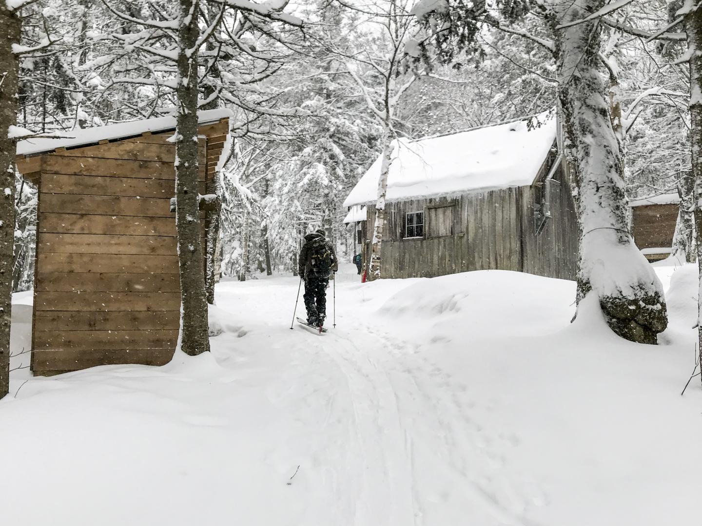 A person skinning in the backcountry