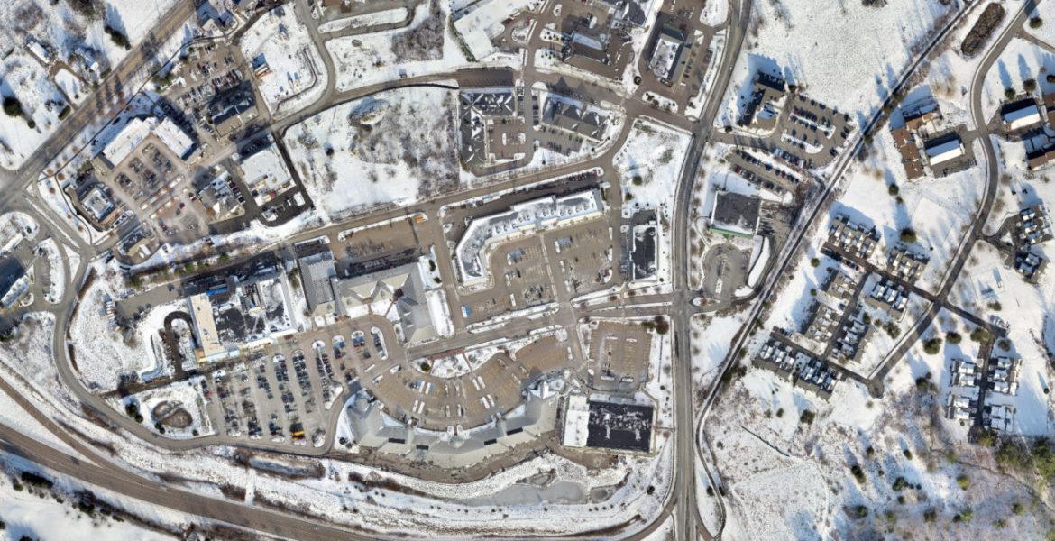 An aerial view of a town in winter