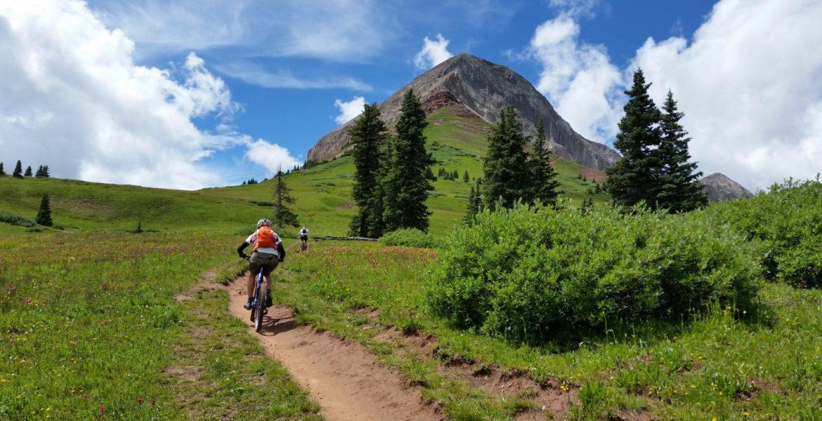 A person biking up a mountain