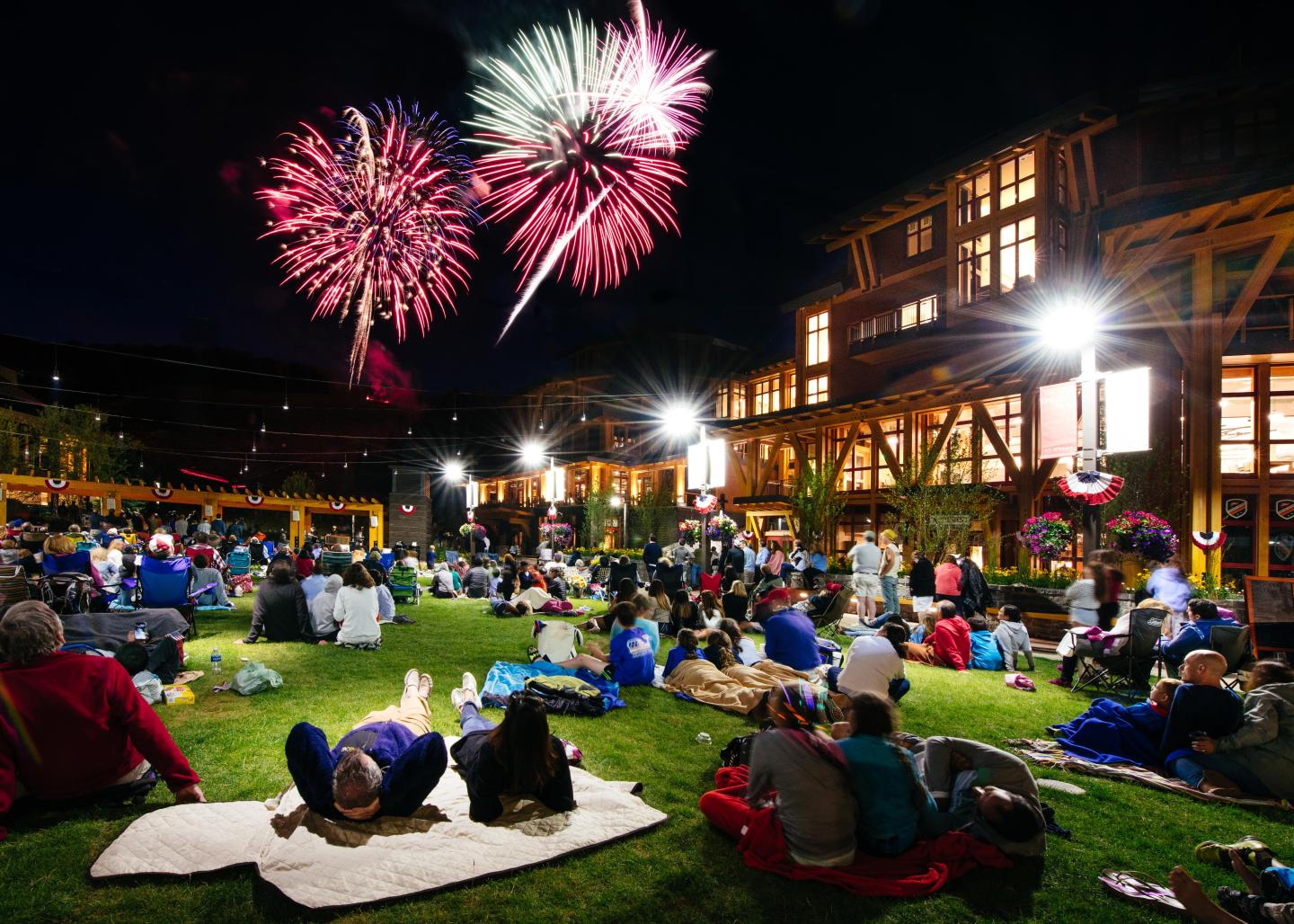 A crowd enjoying a firework display