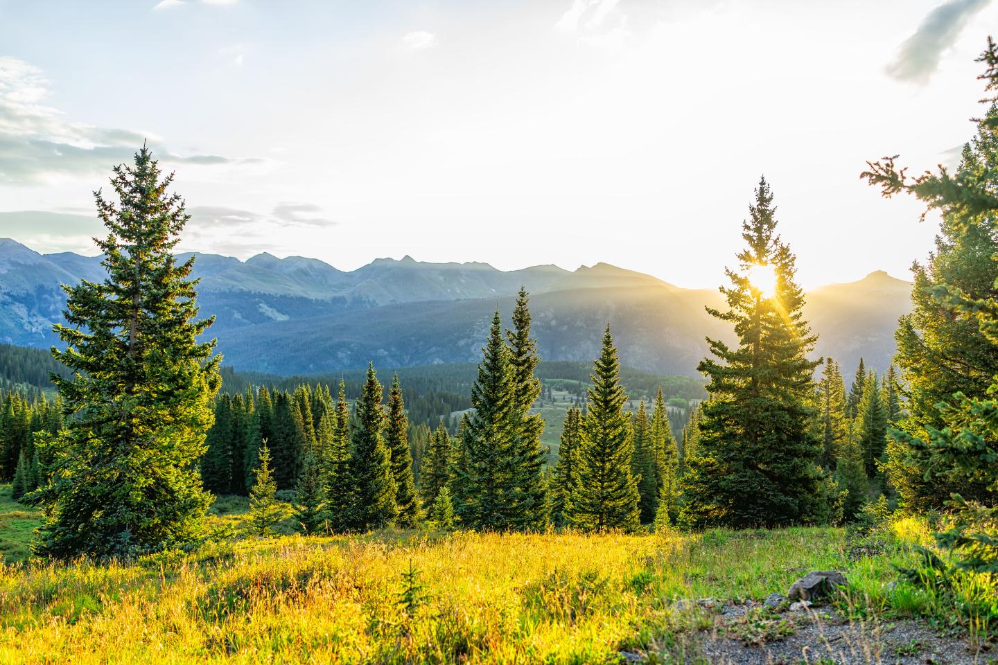 A mountain range at sunset