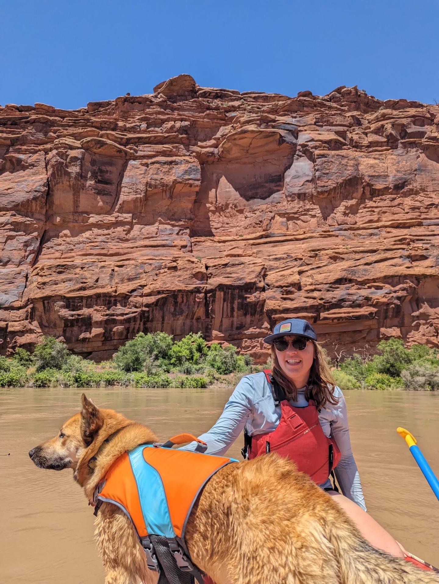 Caroline Jackson in a canyon with her dog