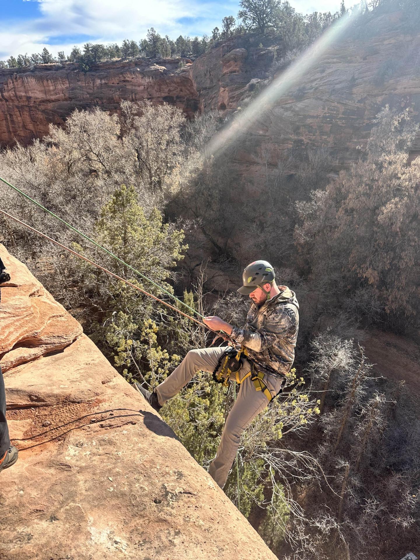 Hadin Jones climbing a mountain